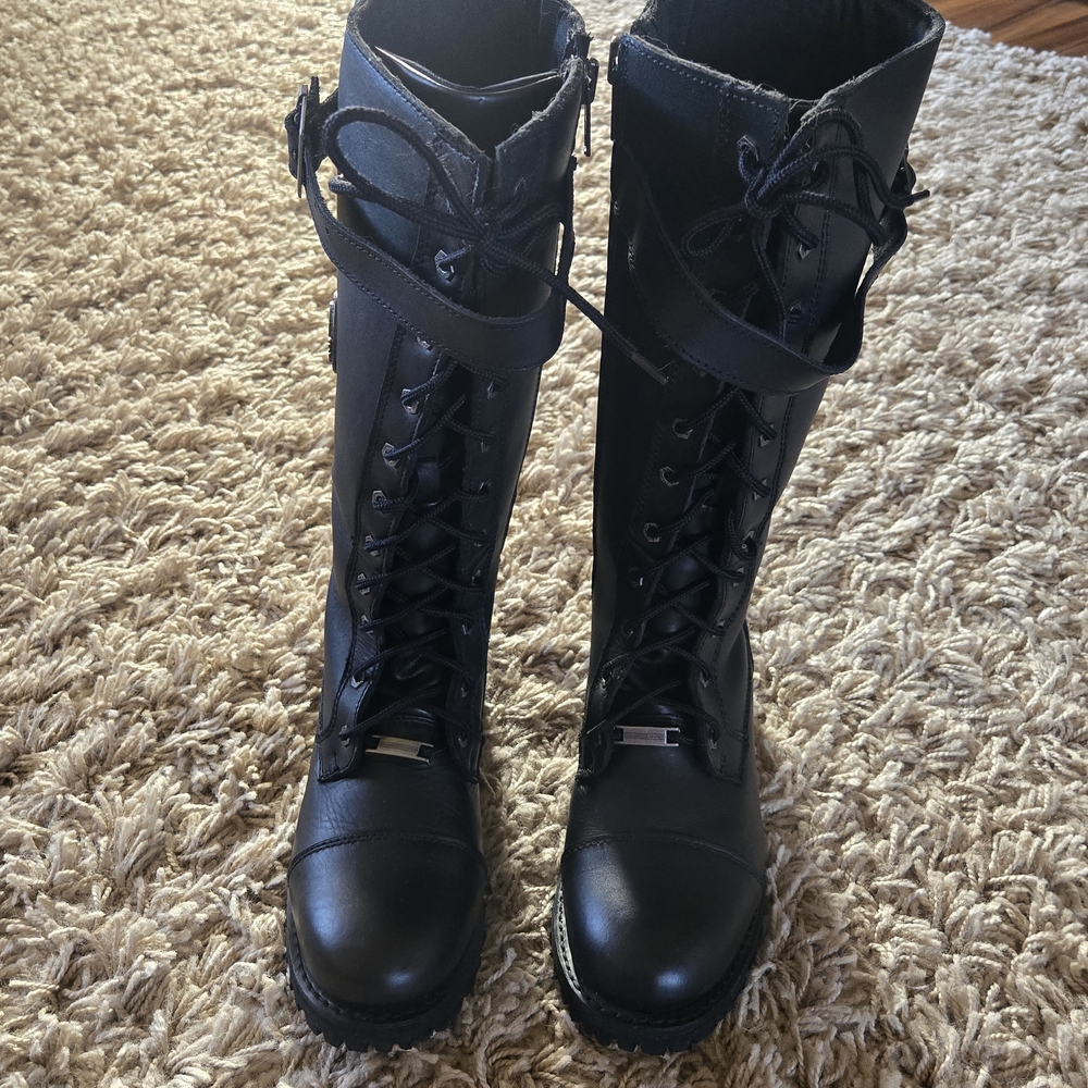 Black Lace-Up Women's Knee-High Combat Boots with Ankle Strap. Retails for $179.